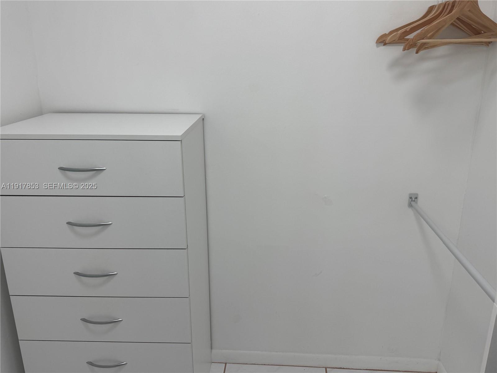 6050 Northwest 64th Avenue, Unit 306 Tamarac, FL 33319 - Photo 22 of 31 a view of a closet