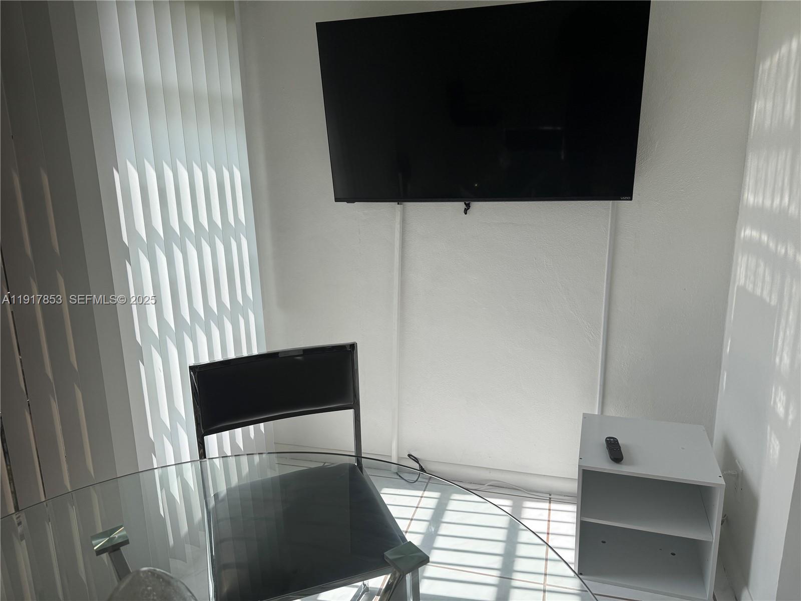 6050 Northwest 64th Avenue, Unit 306 Tamarac, FL 33319 - Photo 26 of 31 a view of entryway with wooden floor