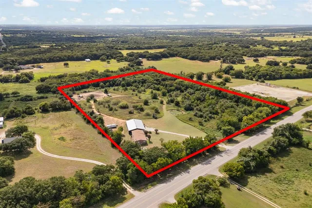 an aerial view of beach and city