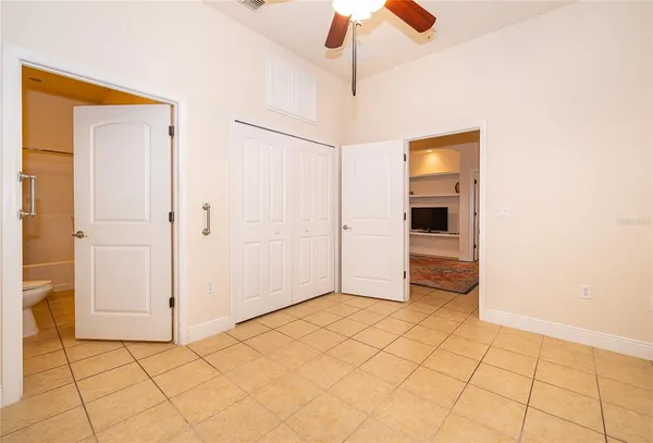 a view of a pathway both side of a house