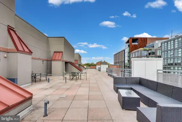 a building outdoor space with patio furniture