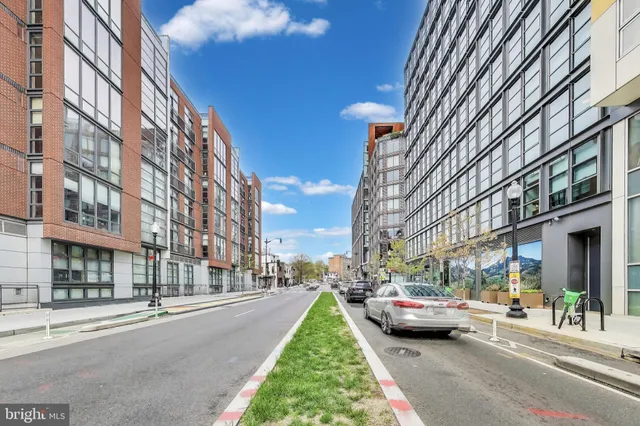 a view of a street with cars