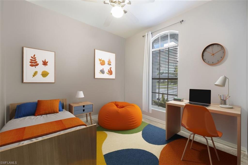 496 Raven Way Naples, FL 34110 - Photo 21 of 31 a workspace with furniture and window