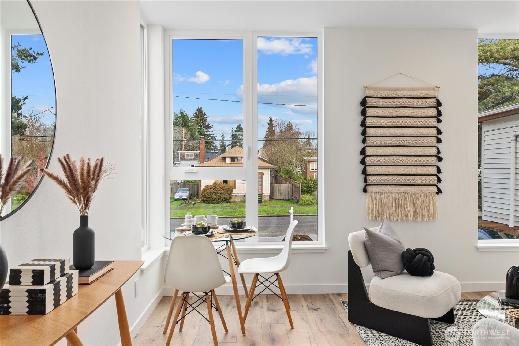 945 Northwest 61st Street Seattle, WA 98107 - Photo 15 of 24 a dining room with furniture and wooden floor