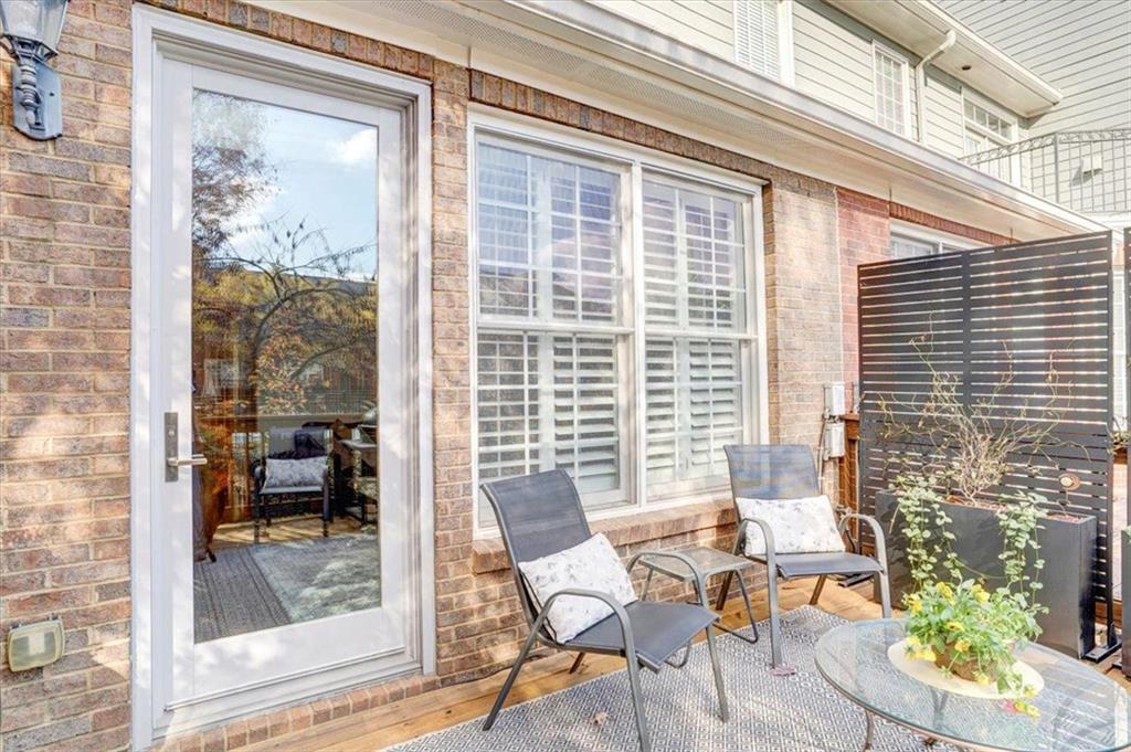 188 Centennial Way Atlanta, GA 30313 - Photo 12 of 30 a balcony with couple of chairs and a potted plant