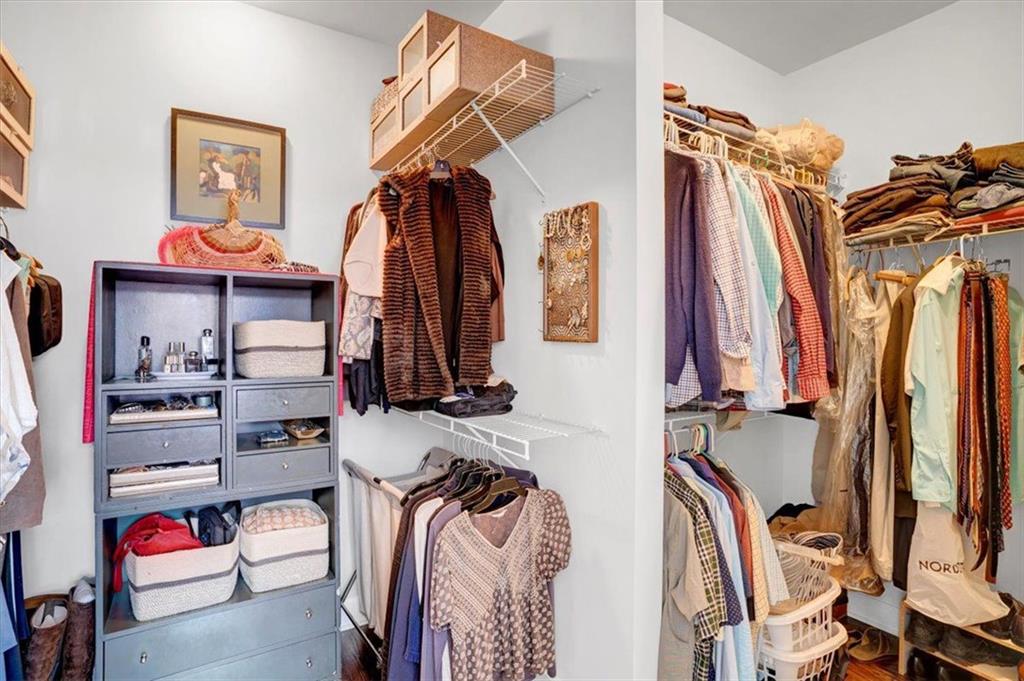 188 Centennial Way Atlanta, GA 30313 - Photo 19 of 30 a view of walk in closet with clothes and shoes