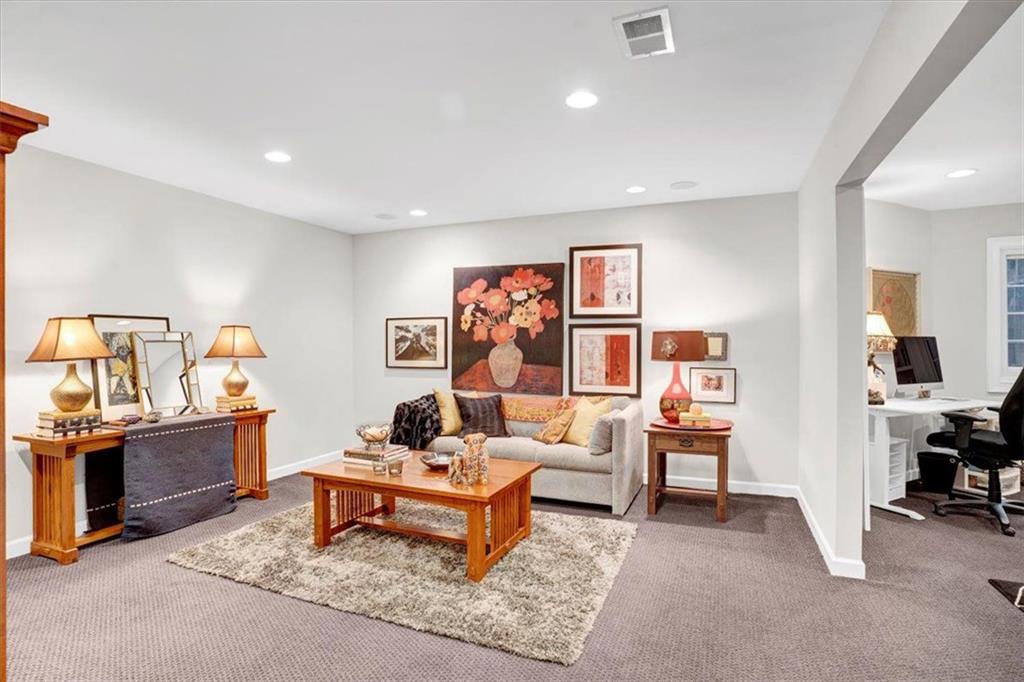 188 Centennial Way Atlanta, GA 30313 - Photo 25 of 30 a living room with furniture and a dining table with bookshelf