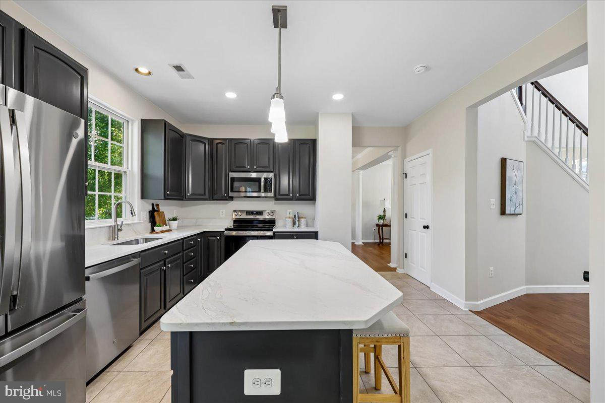107 Redcloud Court Frederick, MD 21702 - Photo 16 of 78 Modern kitchen with sleek finishes.