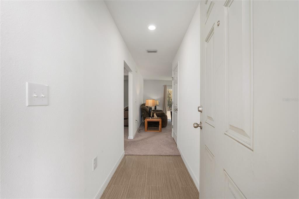 4400 Southwest 155th Street Ocala, FL 34473 - Photo 13 of 41 a view of a hallway with a livingroom and a hallway