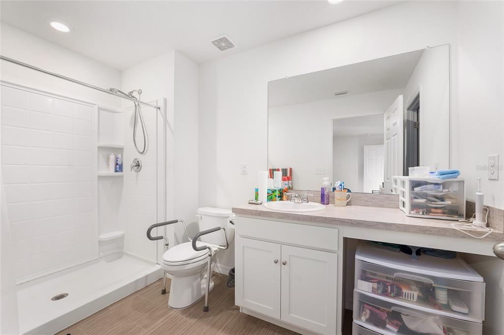 4400 Southwest 155th Street Ocala, FL 34473 - Photo 40 of 41 a bathroom with a sink toilet tub and shower