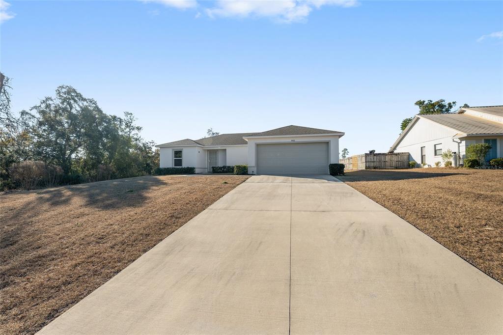 4400 Southwest 155th Street Ocala, FL 34473 - Photo 5 of 41 a view of a house with backyard