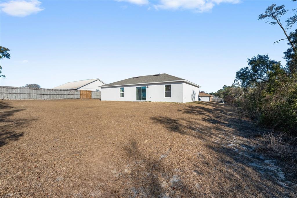 4400 Southwest 155th Street Ocala, FL 34473 - Photo 8 of 41 a view of house with yard and lake view