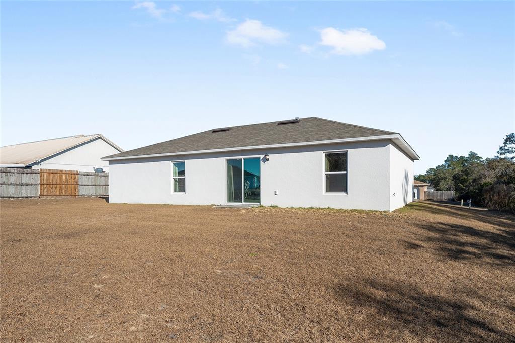 4400 Southwest 155th Street Ocala, FL 34473 - Photo 9 of 41 a view of house with yard and garage
