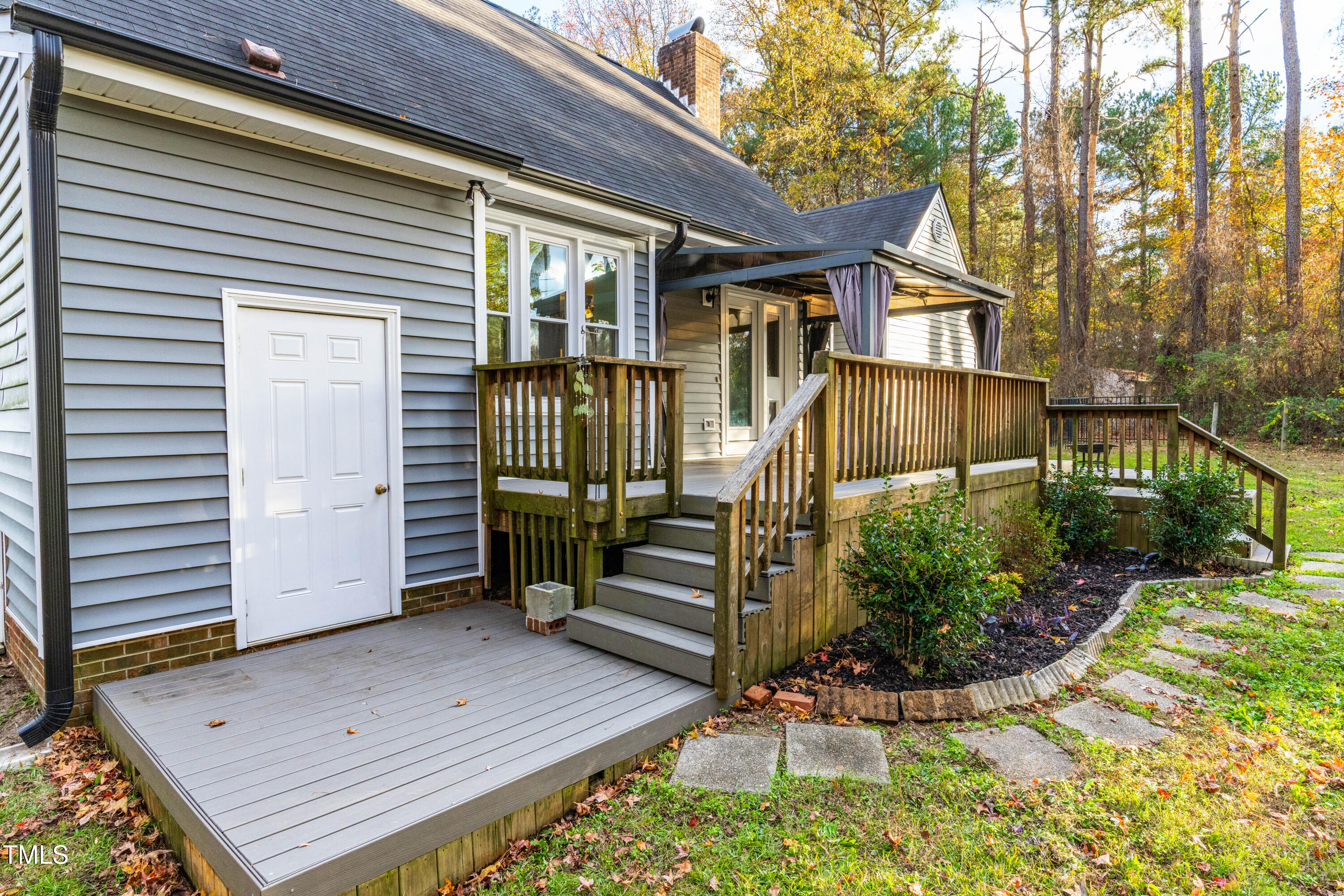 1862 Ranch Road Clayton, NC 27520 - Photo 22 of 26 a view of a house with a small yard
