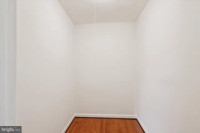 a view of wooden floor in a bathroom
