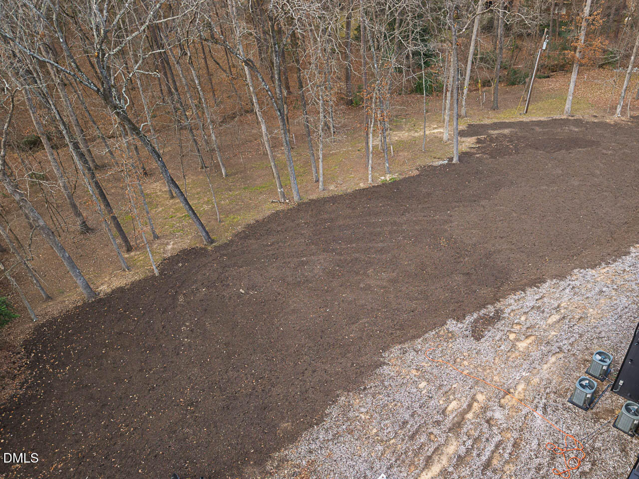 3946 Nottaway Road Durham, NC 27707 - Photo 7 of 18 a view of a yard with a trees