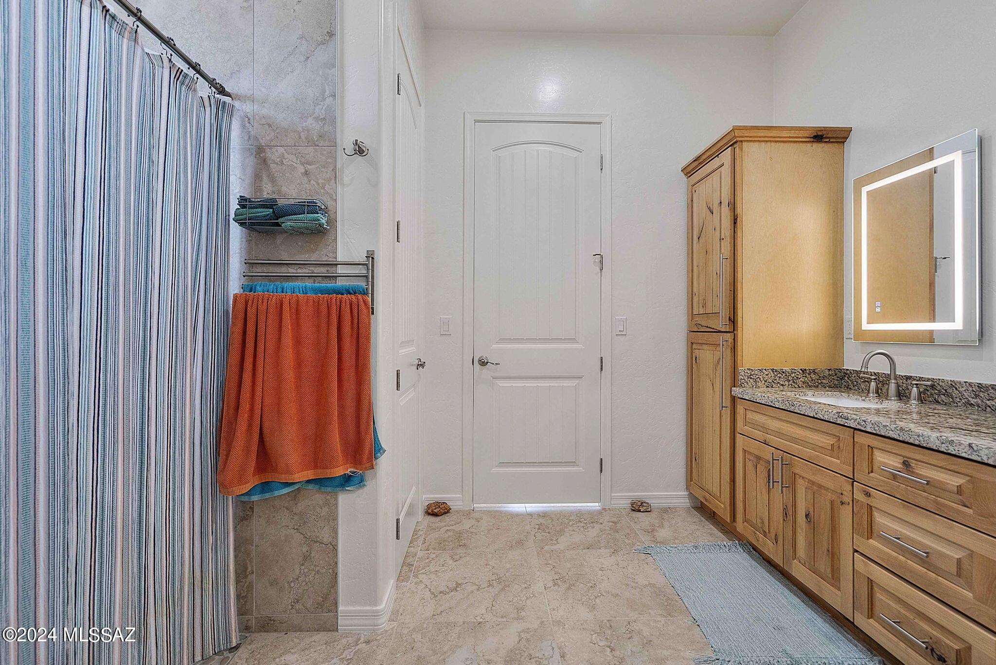 22 Vigas Lane Rio Rico, AZ 85648 - Photo 5 of 40 a bathroom with a sink and a mirror