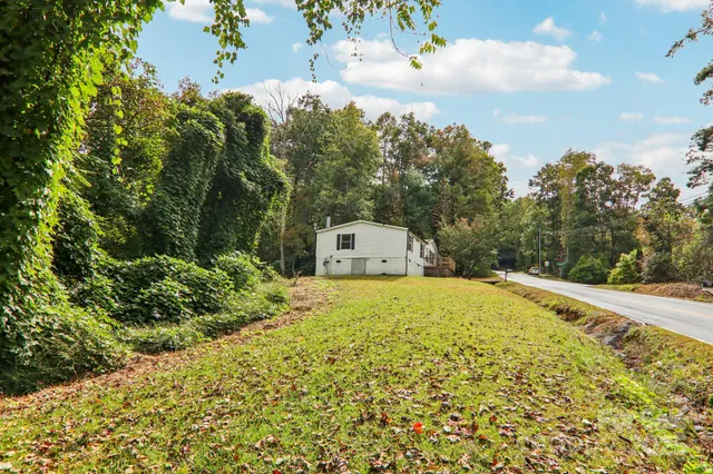 a house with trees in the background