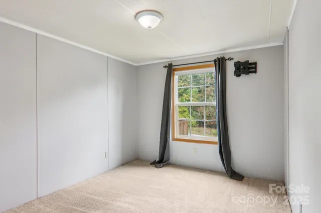 an empty room with windows