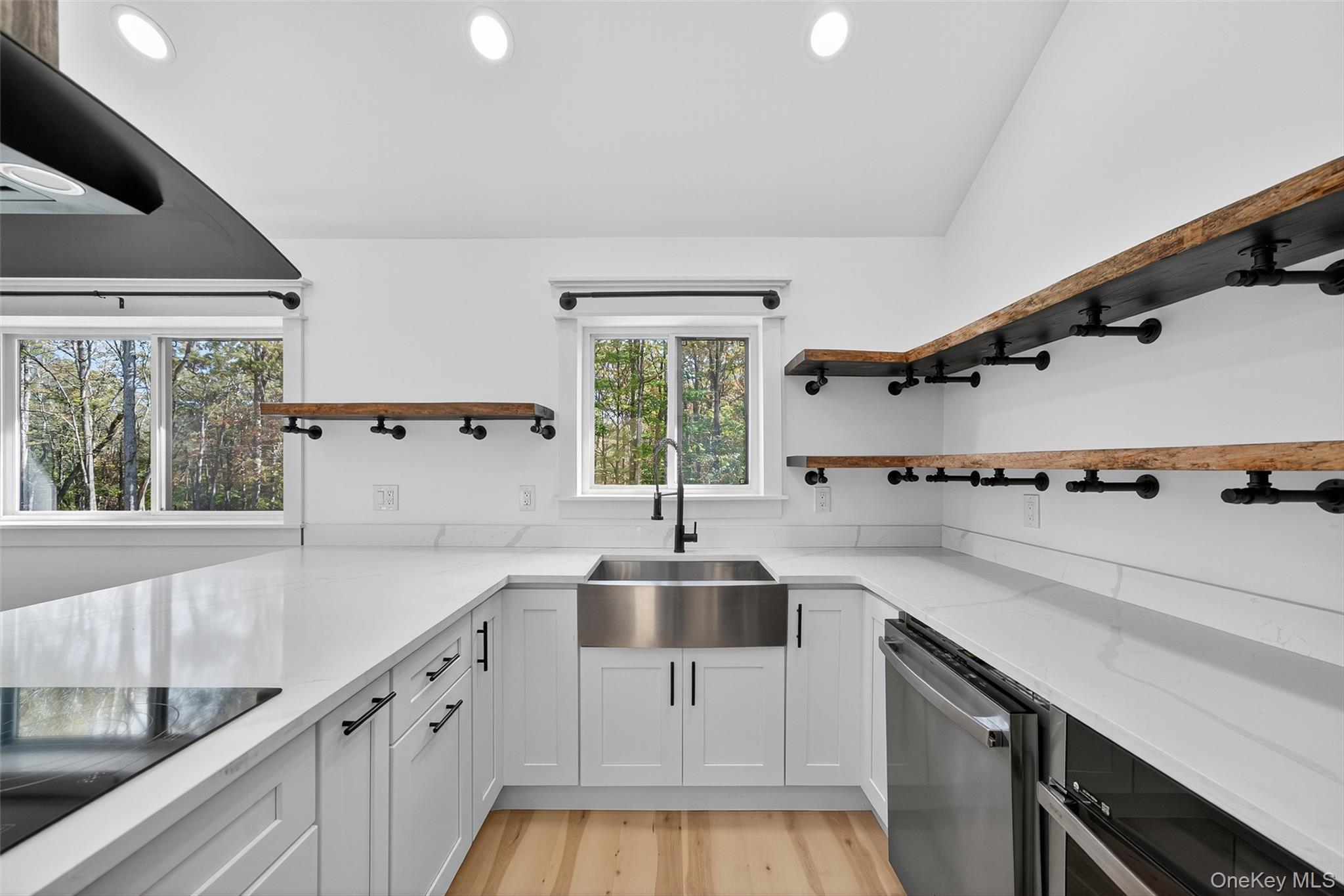273 Perry Pond Road Narrowsburg, NY 12764 - Photo 18 of 49 Kitchen featuring open shelves, recessed lighting, dishwasher, black electric cooktop, and light stone countertops