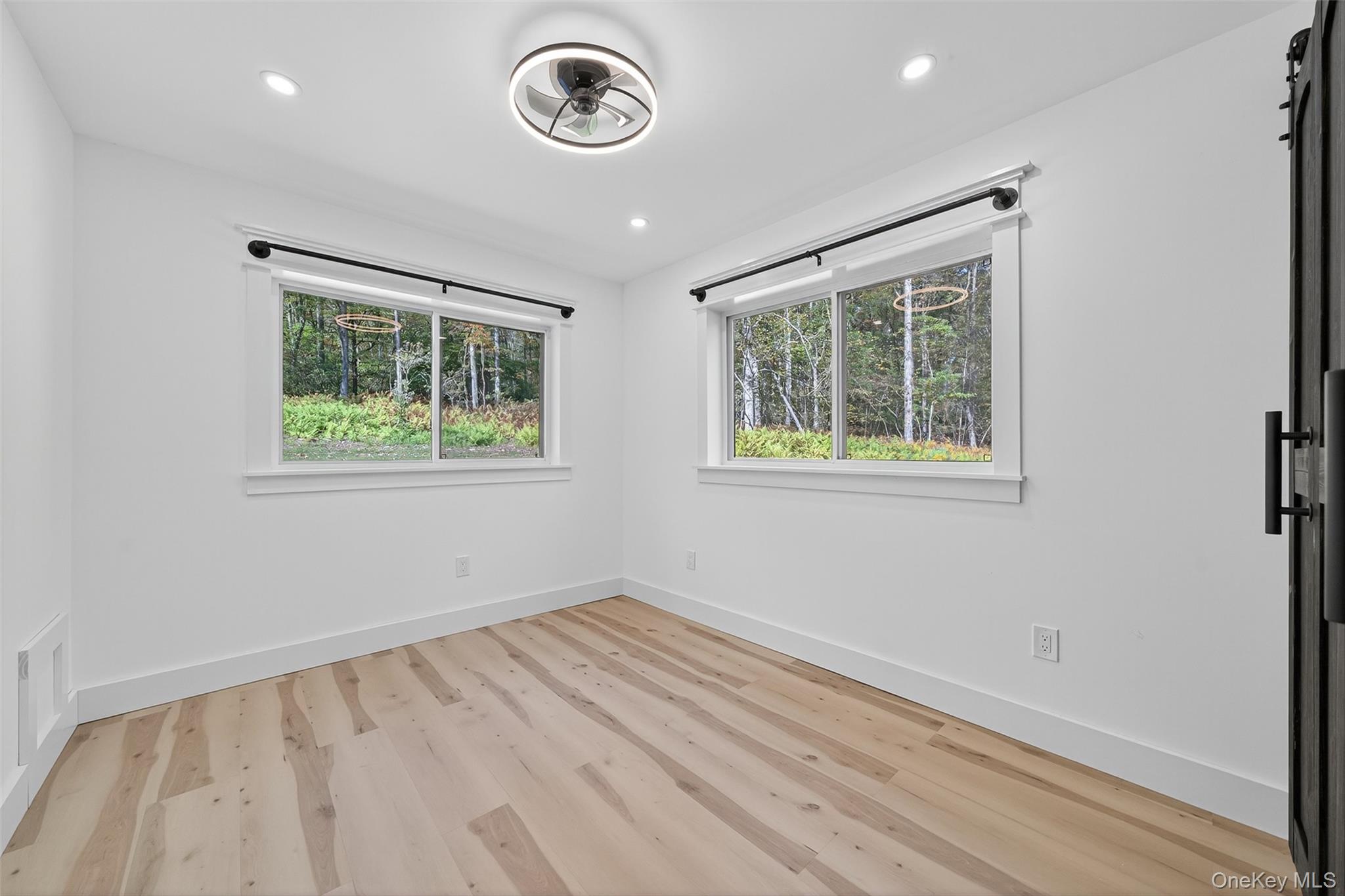 273 Perry Pond Road Narrowsburg, NY 12764 - Photo 34 of 49 Empty room with light wood-type flooring and recessed lighting