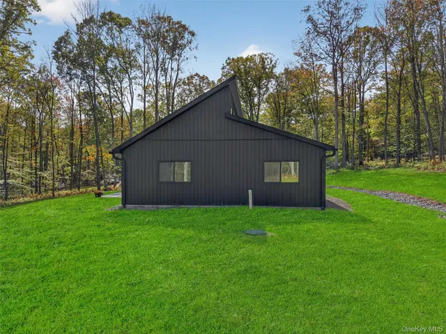 a view of a house with a big yard