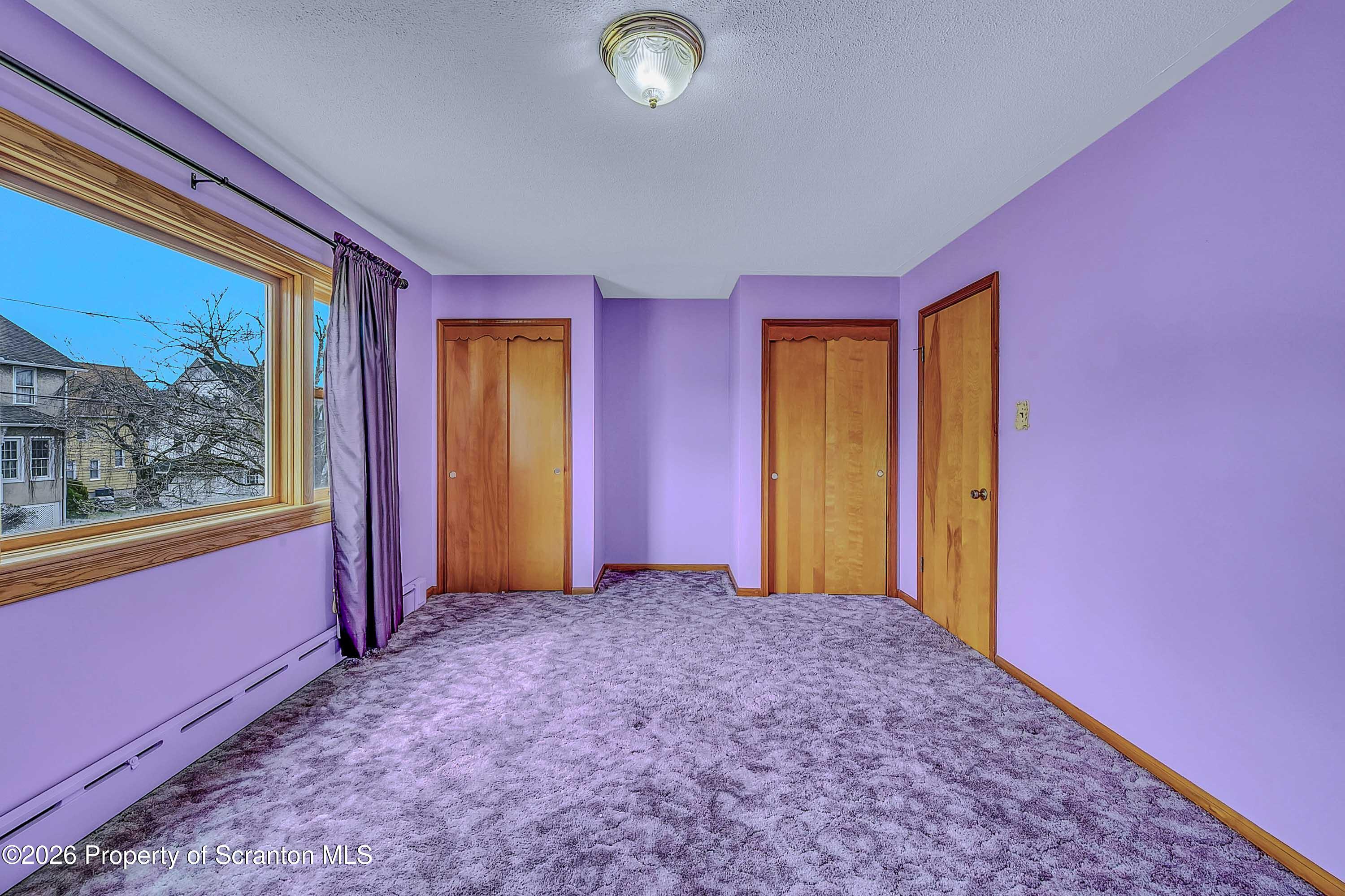 211 Green Street Dunmore, PA 18512 - Photo 12 of 38 a view of empty room with window