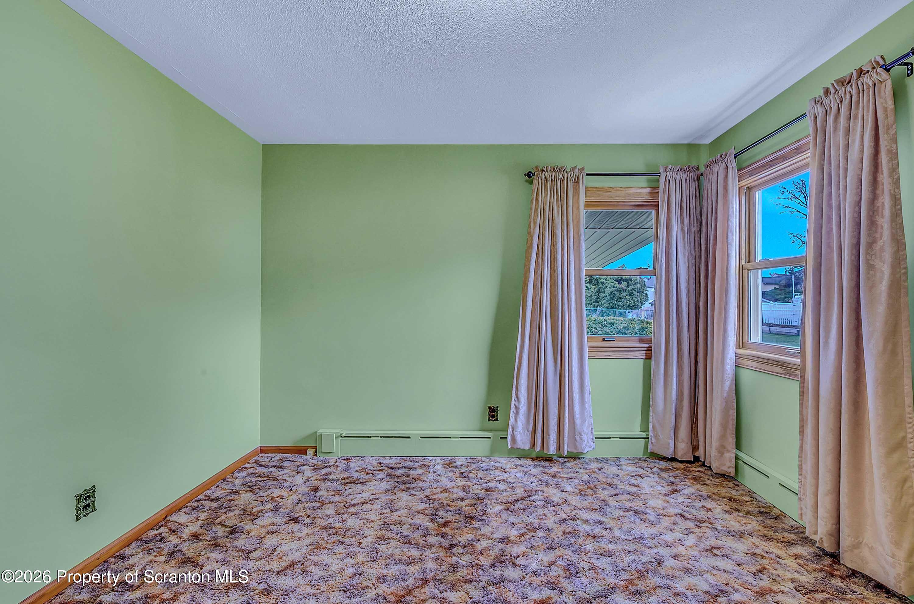 211 Green Street Dunmore, PA 18512 - Photo 15 of 38 a view of a room with tiles and a window