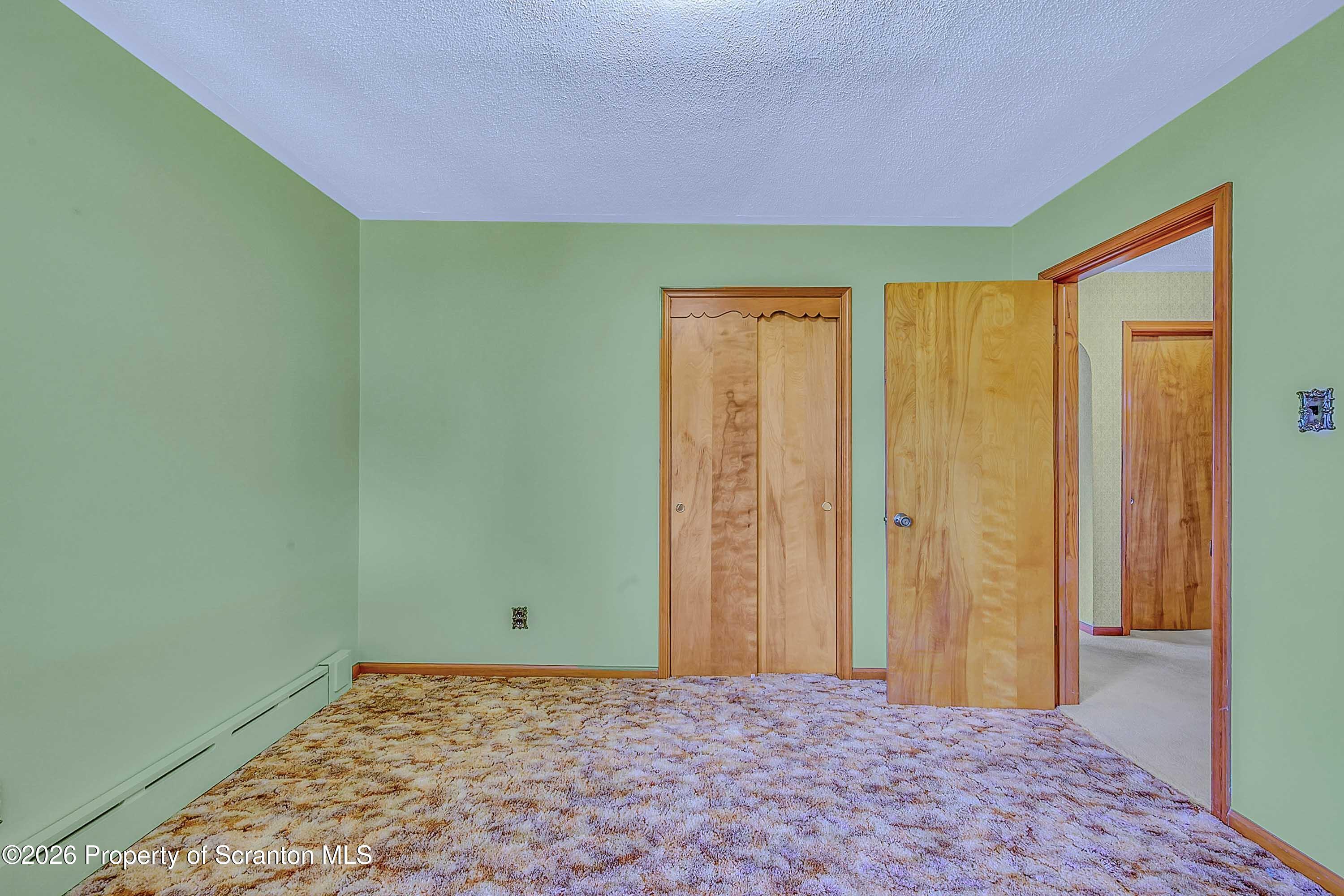 211 Green Street Dunmore, PA 18512 - Photo 16 of 38 a view of a room with a small window