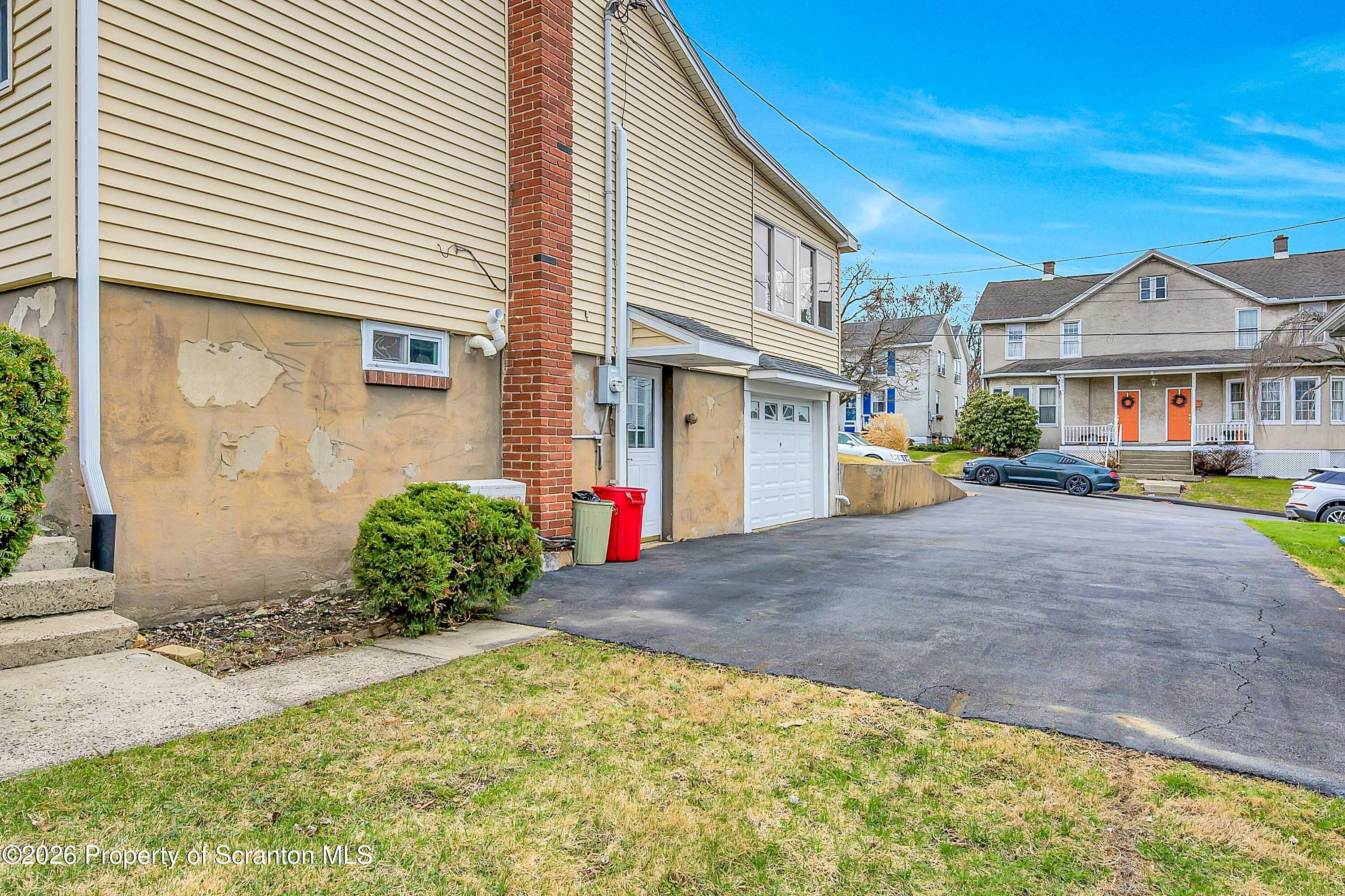 211 Green Street Dunmore, PA 18512 - Photo 17 of 38 a view of street along with house
