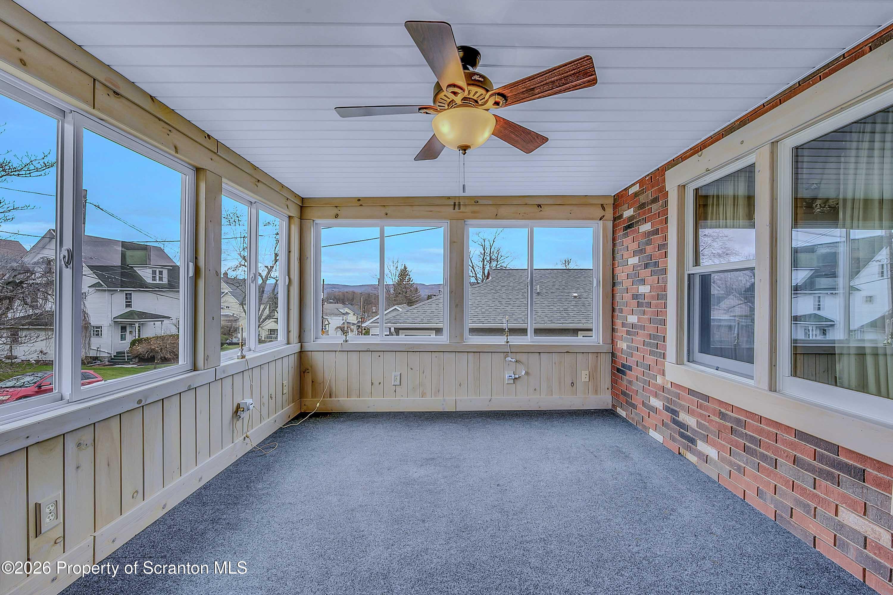 211 Green Street Dunmore, PA 18512 - Photo 2 of 38 a room with window