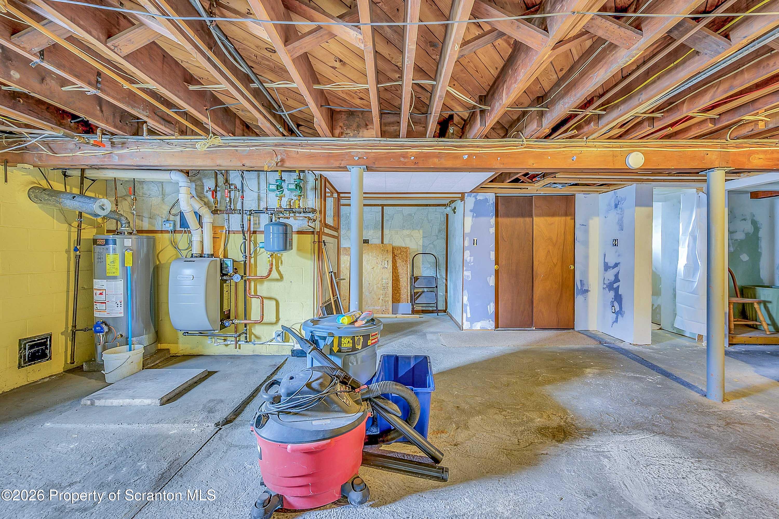 211 Green Street Dunmore, PA 18512 - Photo 28 of 38 a living room with patio furniture and a chandelier