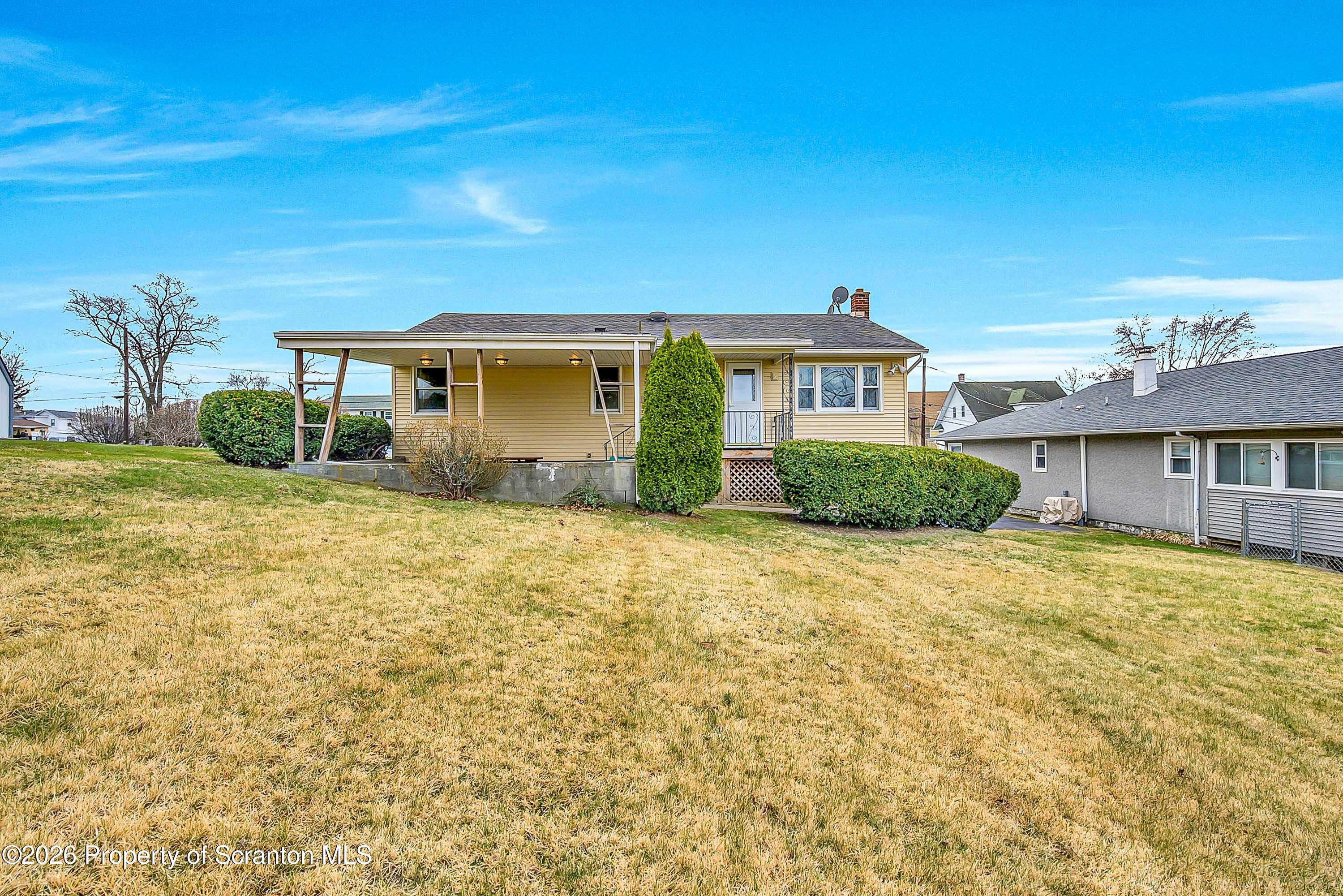 211 Green Street Dunmore, PA 18512 - Photo 38 of 38 front view of a house with a yard