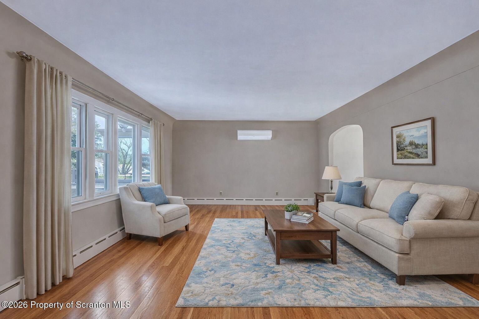 211 Green Street Dunmore, PA 18512 - Photo 4 of 38 a living room with furniture and a large window