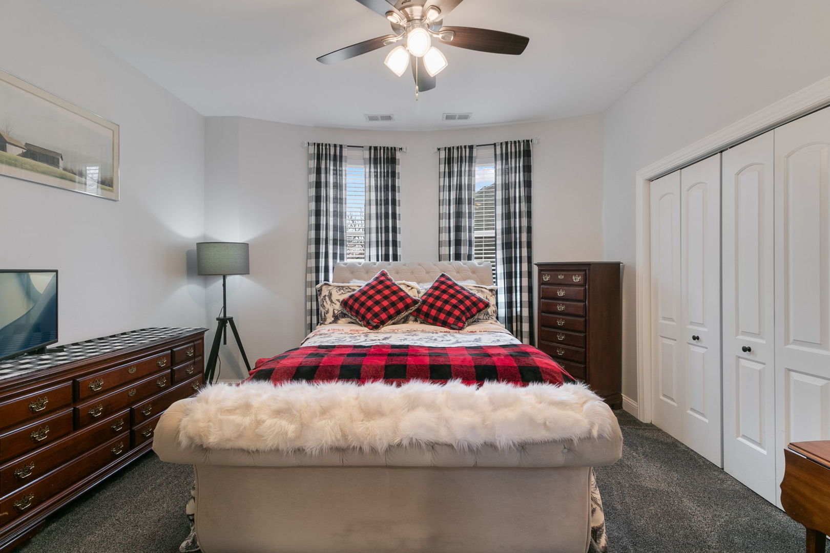 3239 Wesley Avenue Berwyn, IL 60402 - Photo 13 of 29 a bedroom with a bed and a chandelier