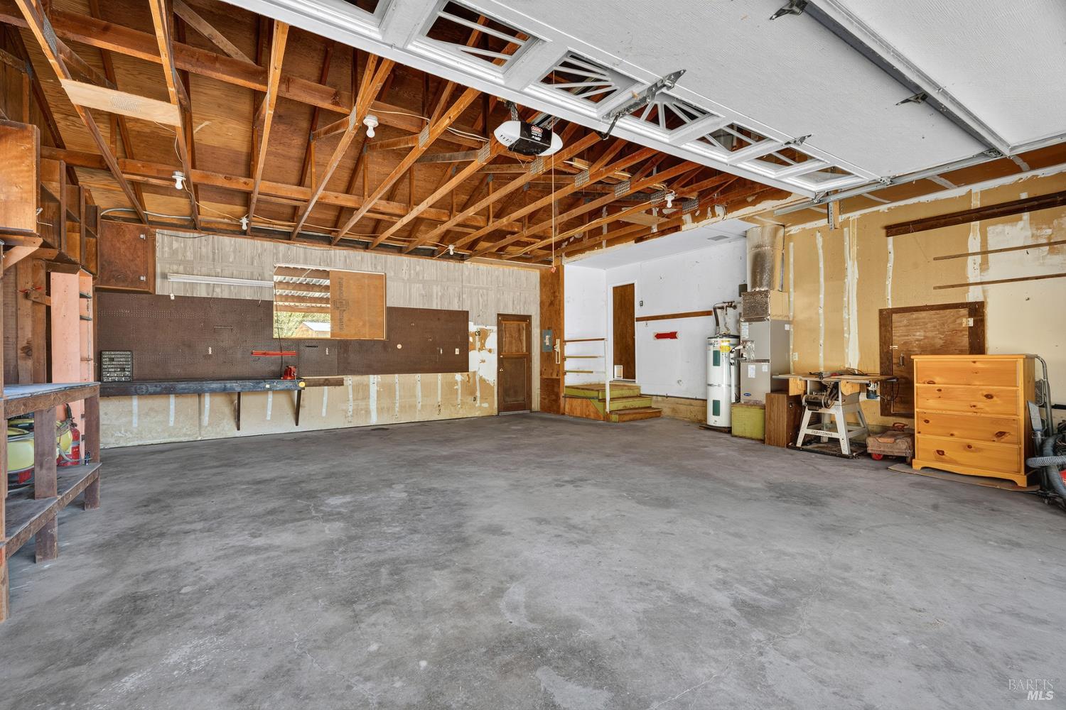 4555 East Calpella Road Ukiah, CA 95482 - Photo 24 of 35 Large oversized garage with door leading to covered area outside.