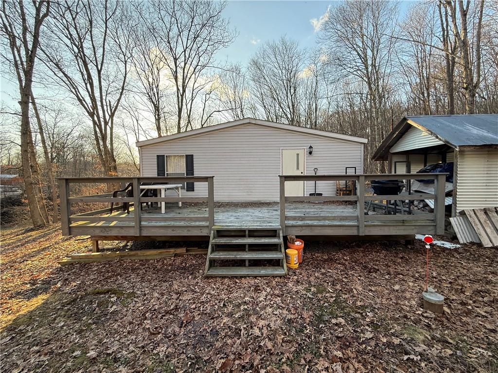 1106 Gary Road Rockwood, PA 15557 - Photo 1 of 46 a view of a house with a yard and a large tree
