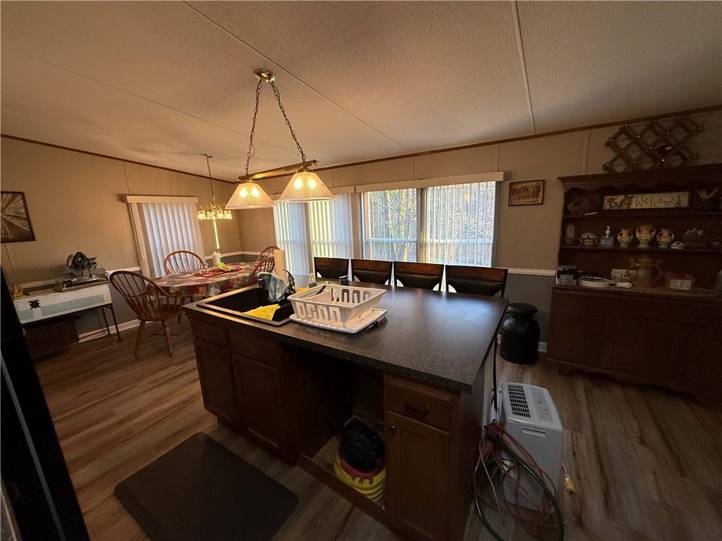 1106 Gary Road Rockwood, PA 15557 - Photo 11 of 46 a view of a a dining room with furniture window and wooden floor