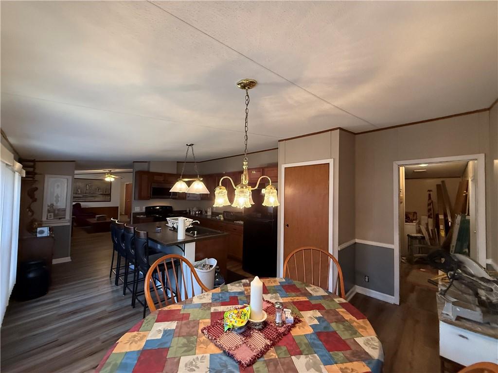 1106 Gary Road Rockwood, PA 15557 - Photo 15 of 46 a view of a dining room with furniture window and wooden floor