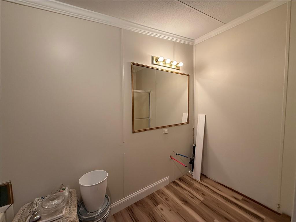 1106 Gary Road Rockwood, PA 15557 - Photo 23 of 46 a bathroom with a toilet and a mirror