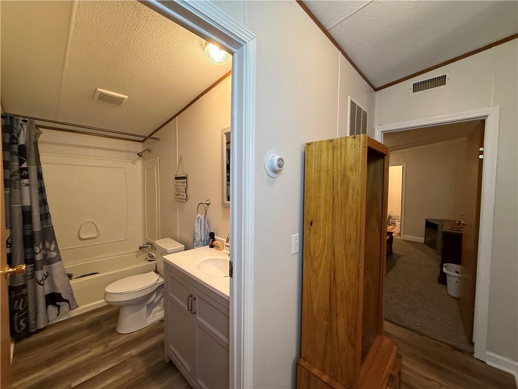 1106 Gary Road Rockwood, PA 15557 - Photo 33 of 46 a bathroom with a double vanity sink toilet and shower