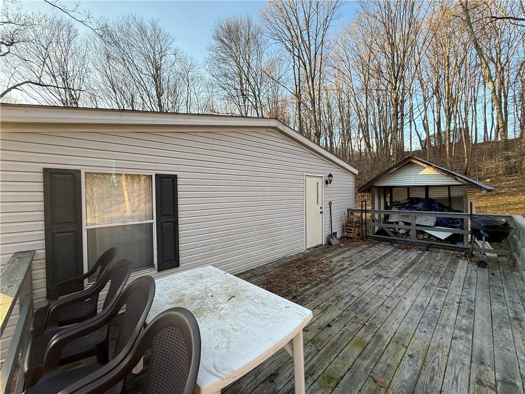 1106 Gary Road Rockwood, PA 15557 - Photo 36 of 46 a view of house with wooden deck and furniture