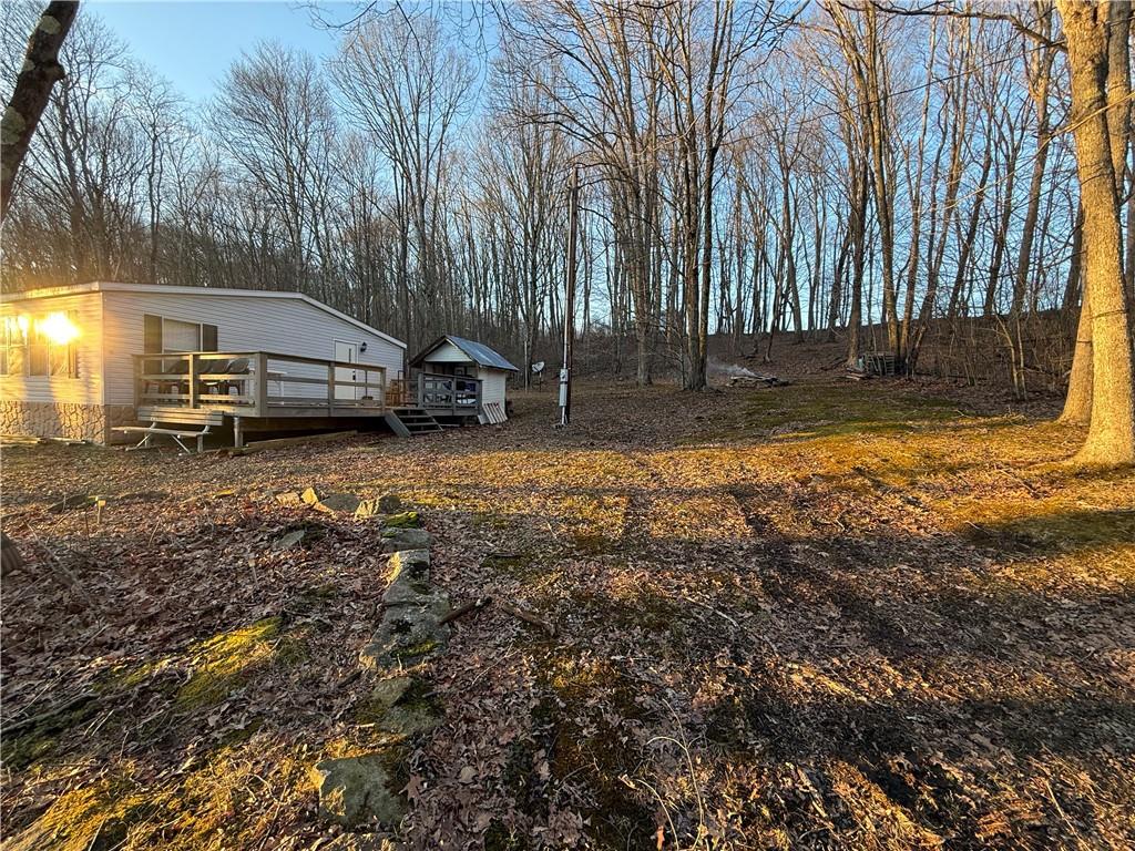 1106 Gary Road Rockwood, PA 15557 - Photo 41 of 46 a view of a yard with wooden fence