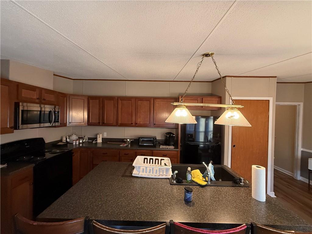 1106 Gary Road Rockwood, PA 15557 - Photo 9 of 46 a kitchen with a sink appliances and cabinets