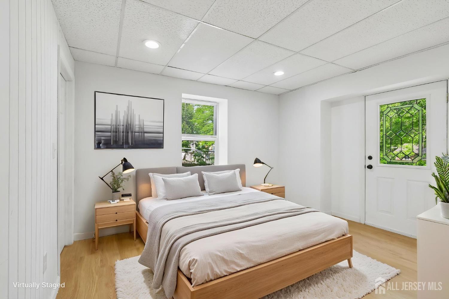 36 Henry Street Edison, NJ 08820 - Photo 23 of 42 a bedroom with a large bed and a window