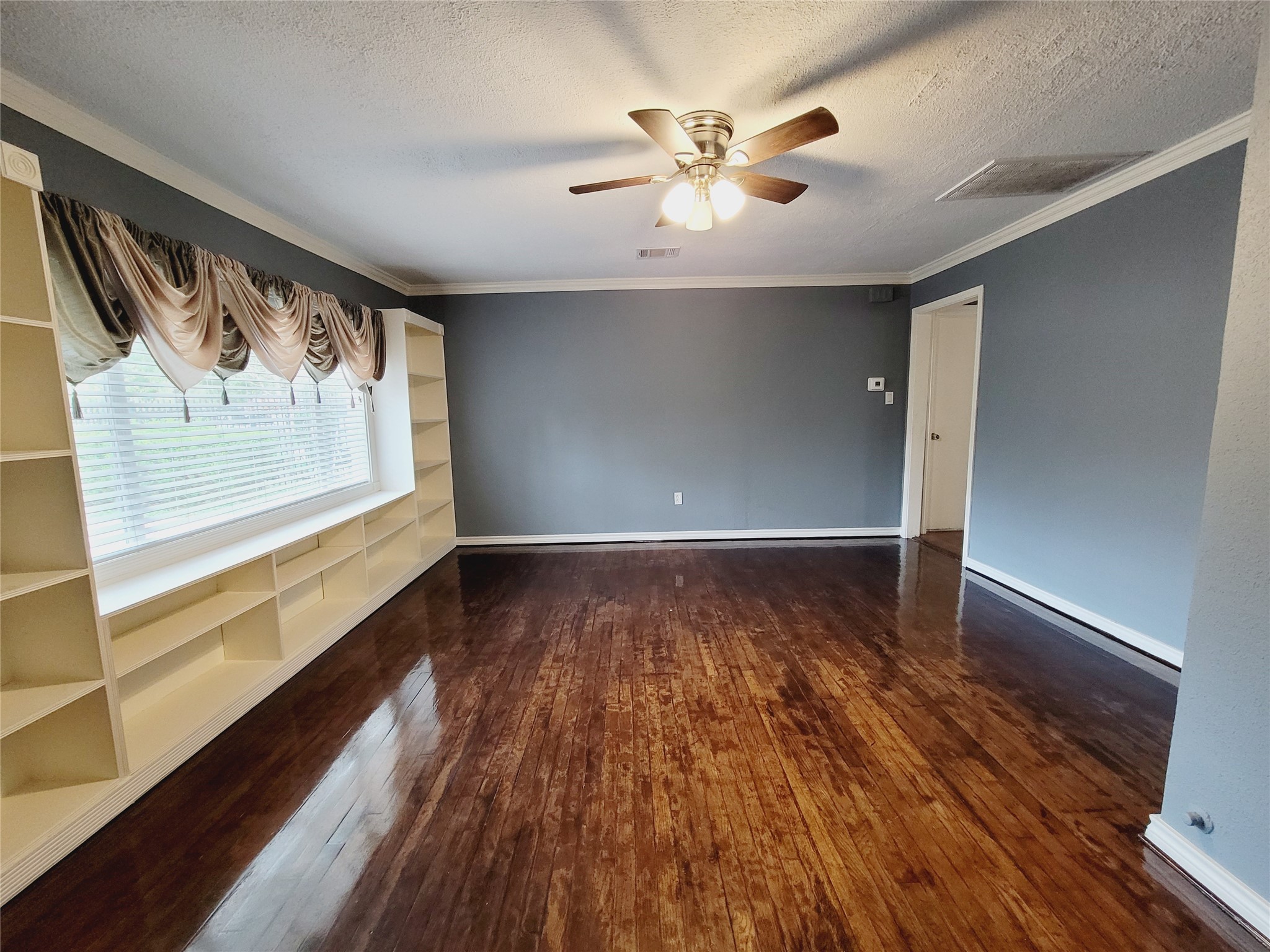 7535 Thurow Street Houston, TX 77087 - Photo 6 of 26 Wood floor recently varnished