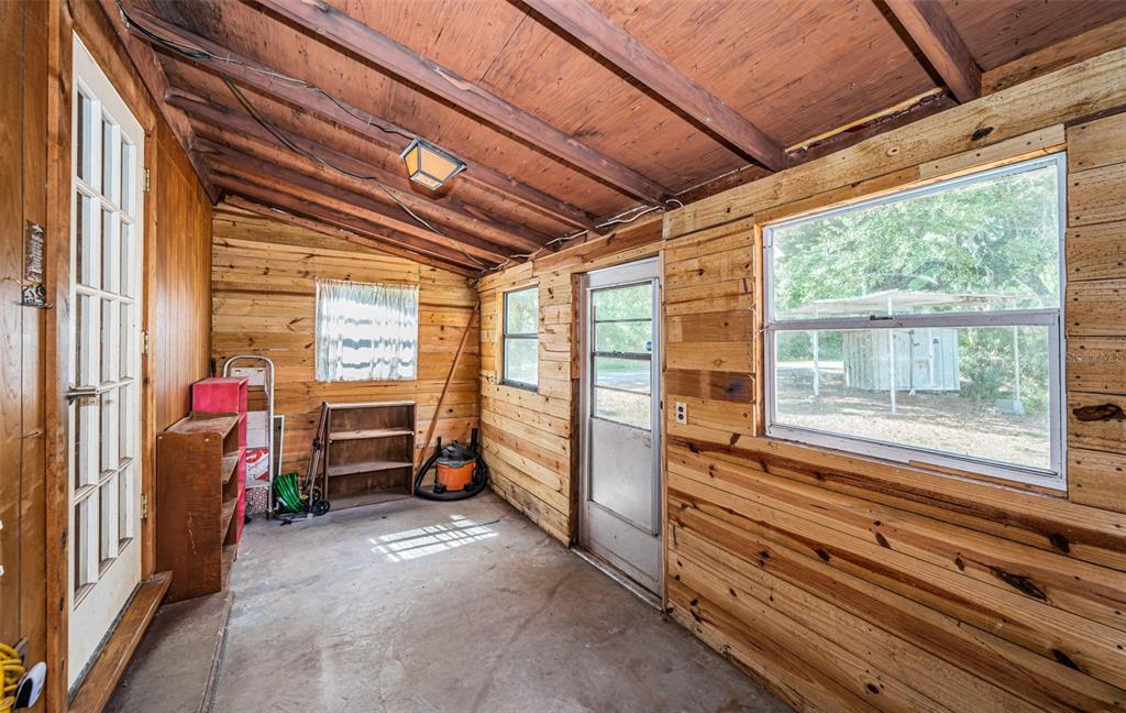6423 Bass Road Weeki Wachee, FL 34607 - Photo 27 of 49 a view of storage and utility room