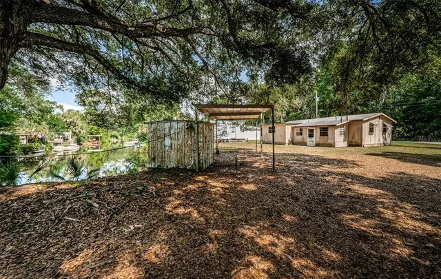 a view of a garden with a lake
