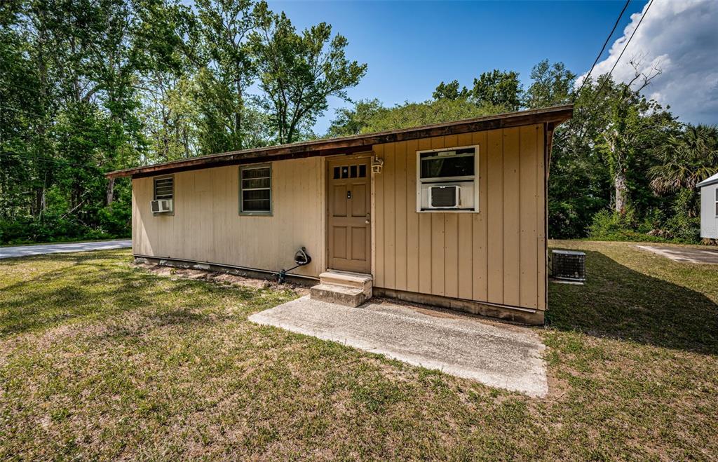 6423 Bass Road Weeki Wachee, FL 34607 - Photo 6 of 49 a view of a backyard