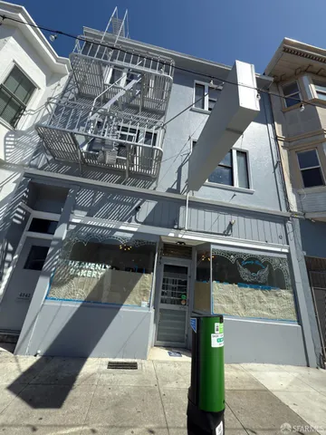 a view of a chairs and table in the patio